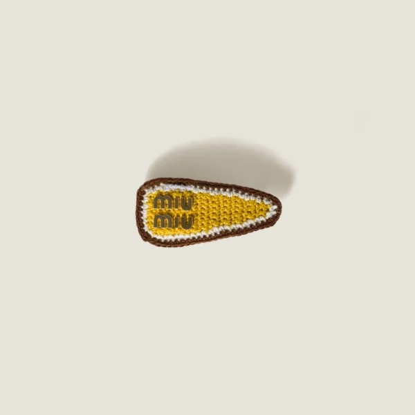 Miu Miu crochet hair clip with delicate woven texture and logo detail