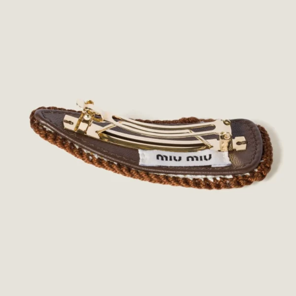 Miu Miu crochet hair clip displayed on neutral background