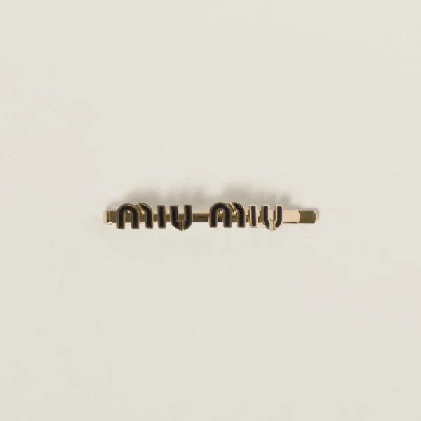 Miu Miu enameled metal hair clip in glossy black with engraved logo
