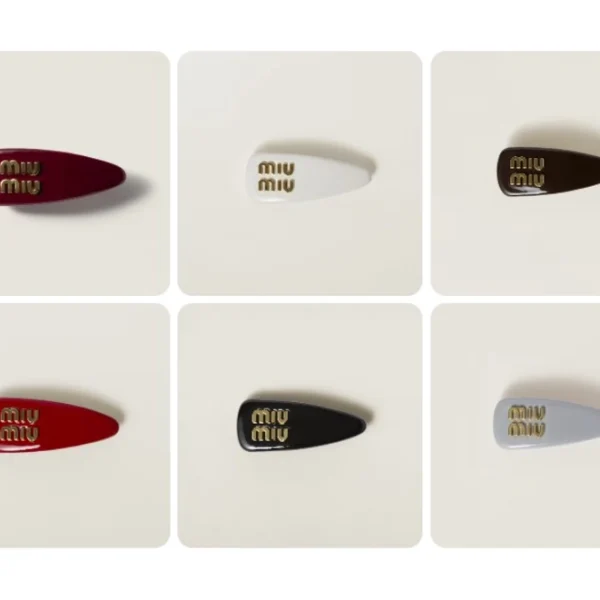 Miu Miu patent leather hair clip featuring glossy finish and sleek minimalist design