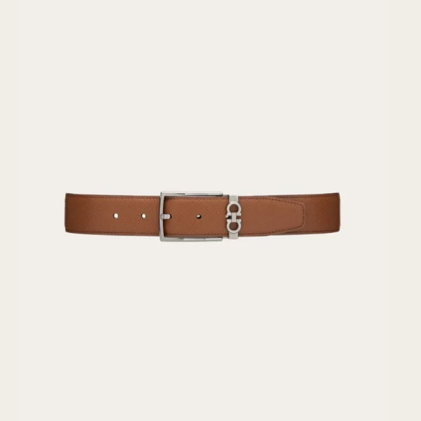 Ferragamo Reversible and Adjustable Gancini Belt made from premium leather, with iconic double-sided styling and signature buckle