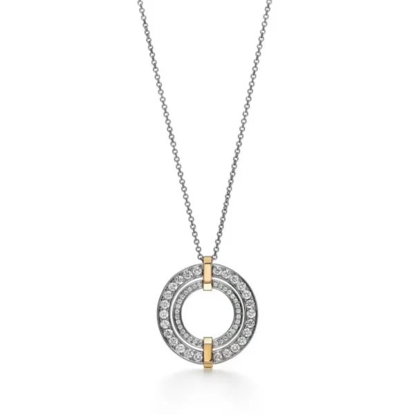 Tiffany Edge Circle Pendant in platinum and yellow gold, small size, set with round brilliant diamonds in a sculptural frame