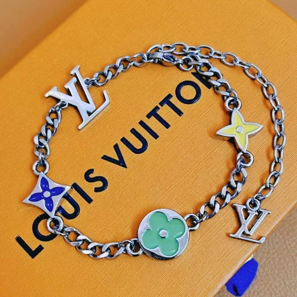 LV Monogram Row Bracelet styled on wrist creating a sleek designer accent