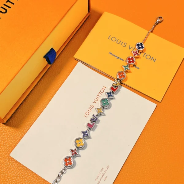 Original packaging displaying Louis Vuitton Monogram Party Bracelet with branded pouch