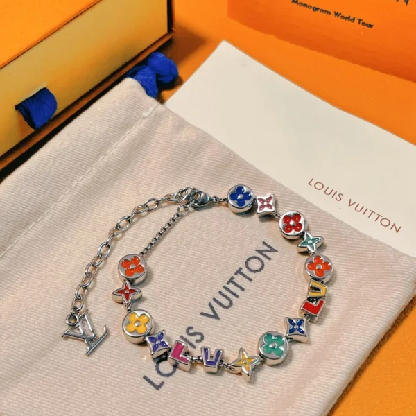 Louis Vuitton Monogram Party Bracelet featuring signature LV charms on polished chain