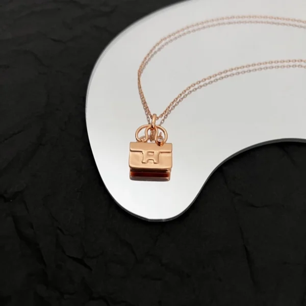 Hermes Constance Amulette Pendant